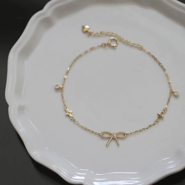 New Zenith S925 Sterling Silver 14K Gold Plated Women's Bracelet With Twisted Butterfly Knot Four Leaf Clover Simple Elegance Hand Jewelry