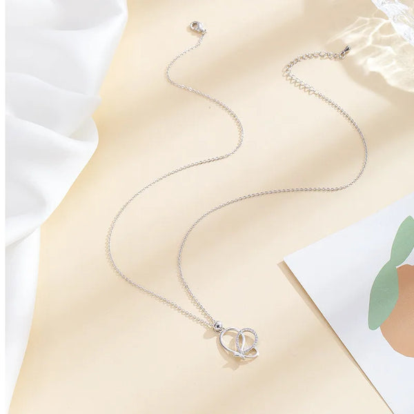 Sweet Silver Butterfly Necklace Featuring a Copper Pendant for Elegant Style