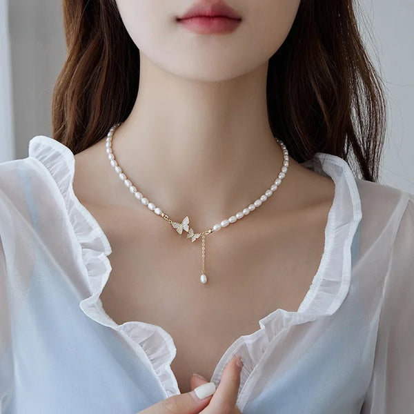 Original Design Natural White 4-5mm Rice Pearl Necklace with Butterfly Pattern and Copper Pendant