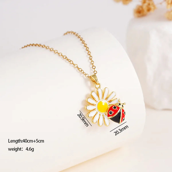 Fashion Sweet Daisy Asymmetric Sunflower Necklace for Women Enamel Color Glaze Small Flower 304 Stainless Steel Copper Pendant Necklace Water Plating Vacuum Plating 18K Real Gold Zircon