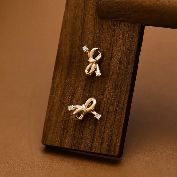 Sweet Bow Tie Stud Earrings for Women in 925 Sterling Silver with 18K Real Gold Plating and Twist Craft, Featuring Zirconia Inlay